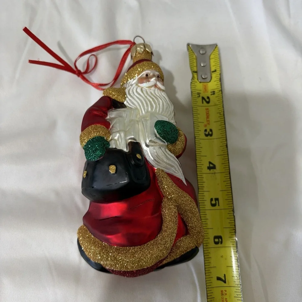 1999 Patricia Breen Through Rain and‎ Snow Santa Ornament Red Coat Bag Glass Vtg